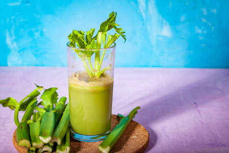 Healthy Celery diet for the treatment of incurable mysterious diseases. Fresh celery juice squeezed out on a juicer.drink, vegetable juice, studio shotの写真素材