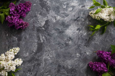 Texture background with bright flowers of lilac for the cover of the notebook diary or congratulations on the woman's holidayの写真素材