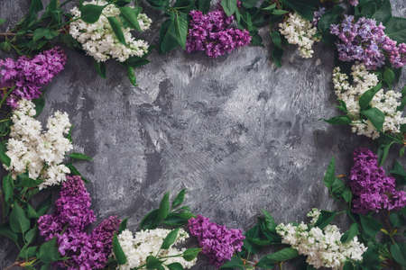 Texture background with bright flowers of lilac for the cover of the notebook diary or congratulations on the woman's holidayの写真素材