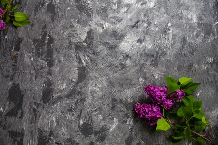 Texture background with bright flowers of lilac for the cover of the notebook diary or congratulations on the womans holidayの写真素材
