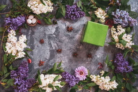 Texture background with bright flowers of lilac for the cover of the notebook diary or congratulations on the womans holidayの写真素材