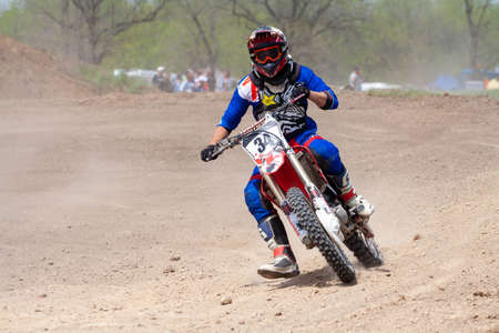 RUSSIA, Novoshakhtinsk - MAY 08, 2021: Motorcyclists ride sports cross-country motorcycles off-roadのeditorial素材