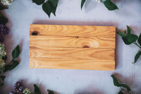 Background for greeting card greeting beloved woman wedding invitation flowers lilac on wooden surfaceの写真素材