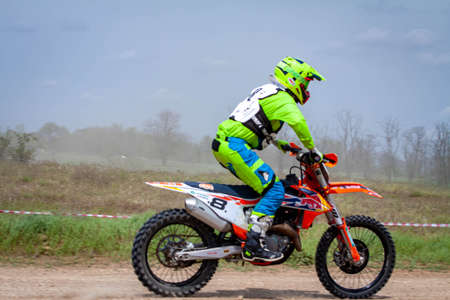 RUSSIA, Novoshakhtinsk - MAY 08, 2021: Motorcyclists ride sports cross-country motorcycles off-roadのeditorial素材