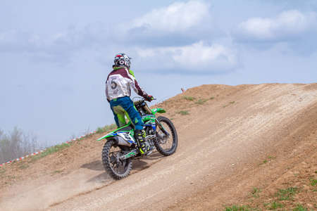 RUSSIA, Novoshakhtinsk - MAY 08, 2021: Motorcyclists ride sports cross-country motorcycles off-roadのeditorial素材