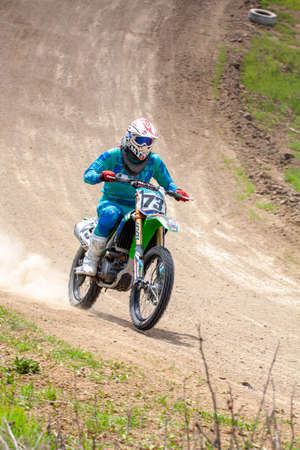RUSSIA, Novoshakhtinsk - MAY 08, 2021: Motorcyclists ride sports cross-country motorcycles off-roadのeditorial素材