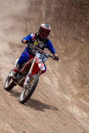 RUSSIA, Novoshakhtinsk - MAY 08, 2021: Motorcyclists ride sports cross-country motorcycles off-roadのeditorial素材
