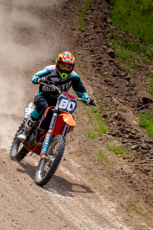 RUSSIA, Novoshakhtinsk - MAY 08, 2021: Motorcyclists ride sports cross-country motorcycles off-roadのeditorial素材