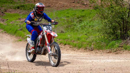 RUSSIA, Novoshakhtinsk - MAY 08, 2021: Motorcyclists ride sports cross-country motorcycles off-roadのeditorial素材