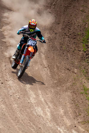 RUSSIA, Novoshakhtinsk - MAY 08, 2021: Motorcyclists ride sports cross-country motorcycles off-roadのeditorial素材