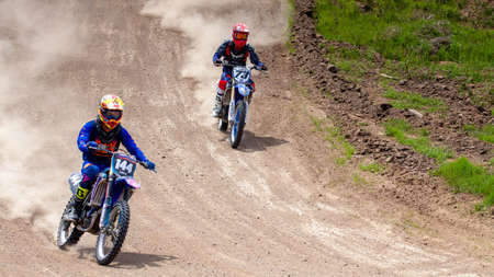 RUSSIA, Novoshakhtinsk - MAY 08, 2021: Motorcyclists ride sports cross-country motorcycles off-roadのeditorial素材