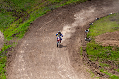 RUSSIA, Novoshakhtinsk - MAY 08, 2021: Motorcyclists ride sports cross-country motorcycles off-roadのeditorial素材