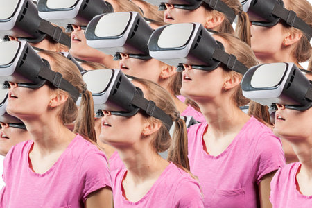 Girl in virtual reality glasses watching surprised shocking video. Young woman looking at futuristic social network map conceptの写真素材