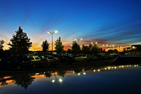 Evening in the parking lot at the supermarket, Olomouc, Czech Republicの写真素材