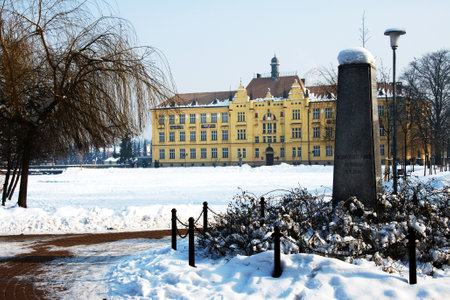 The historic high school building built in 1901, and monument to tornado in 2004, Litovel, Czech Republic のeditorial素材