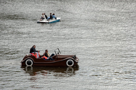 PRAGUE, CZECH REPUBLIC, JUNE 21, 2014 - Relaxation Vltava river cruises before the Charles Bridge のeditorial素材