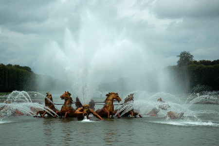 VERSAILLES, FRANCE, AUGUST 19, 2006 - One of the fountain in the castle gardens of Versaillesのeditorial素材