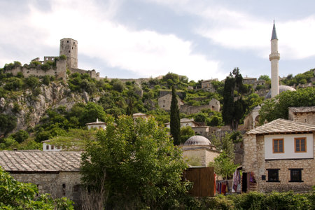 POCITEJL, BOSNIA AND HERZEGOVINA, MAY 12, 2010: The ruins of the castle Pocitelj in Bosnia and Herzegovina and houses under the castleのeditorial素材