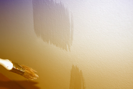 Brush painting on the wallの写真素材