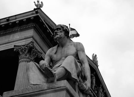 vienna, austrian parliament and statue on the frontの写真素材