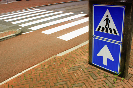 school area with sign for pedestrian crossの写真素材