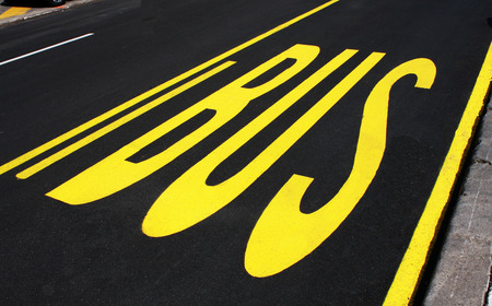 Bus sign on the road. Traffic sing for bus, bus stop sign.の写真素材