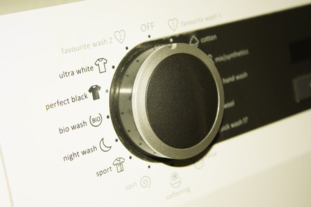 Close-up of clothes washer dialの写真素材
