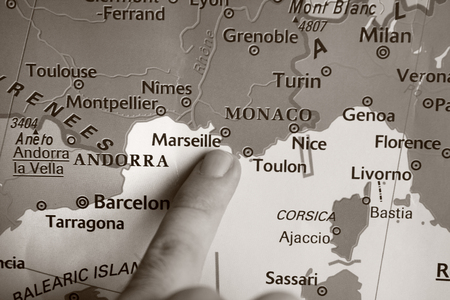 finger pointed on a map - South France