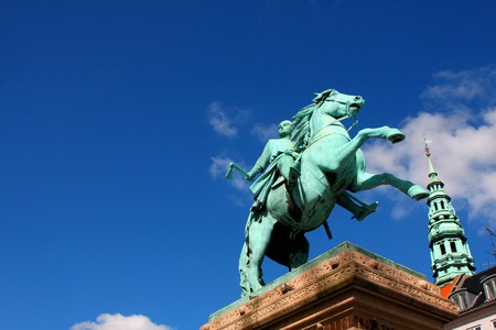 statue of Bishop Absalon and St Kunsthallen Nikolaj church in Copenhagen, Denmarkのeditorial素材