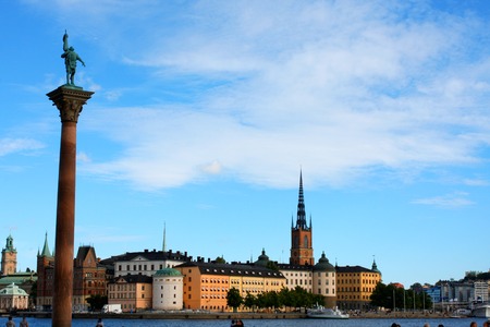 An ancient building in Stockholm used as city hall with city landscapeのeditorial素材