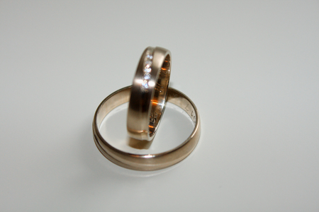 wedding rings isolated on whiteの写真素材