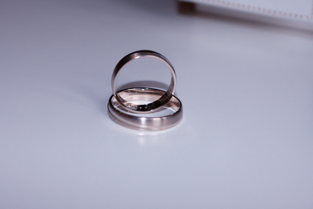 wedding rings isolated on whiteの写真素材