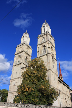 the towers of the Grossmunster church in Zurich in the last sunlightの写真素材