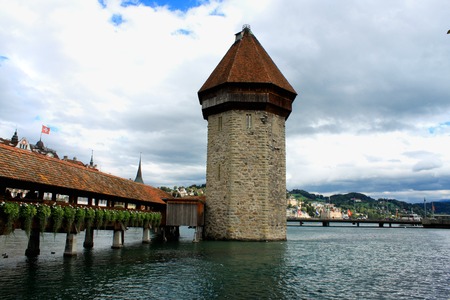 Famous Chapel bridge in Lucerne in a beautiful summer day, Switzerlandの写真素材