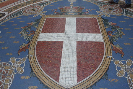 Mosaic on the floor of Galleria Vittorio Emanuele depicting Milan's coat of arms, Italyのeditorial素材