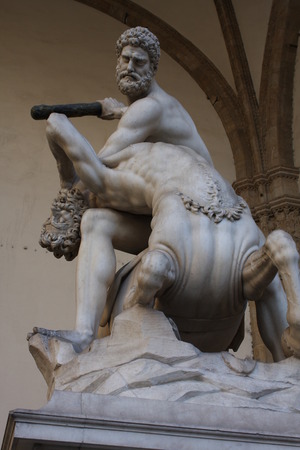 Hercules fighting with centaur Nessus, a mythological tale. This sculpture is a masterpiece of Giambologna in Florence - Italy.のeditorial素材
