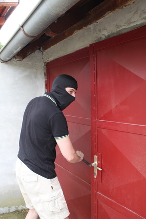 thief trying to break intoの写真素材