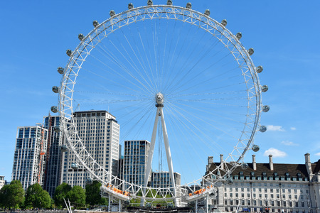 The London Eye on the South Bank of the River Thames at night in London, Englandのeditorial素材