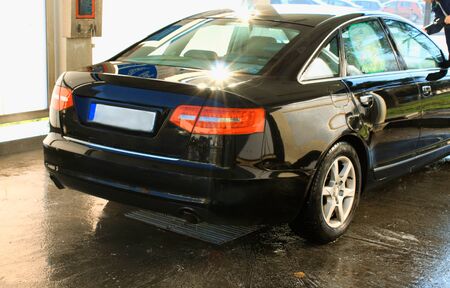 car washing cleaning with hi pressured waterの写真素材