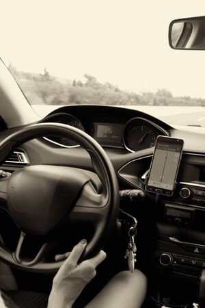 Woman driving on the highwayの写真素材