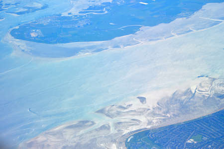 Canal Uk to the France coast from planeの写真素材