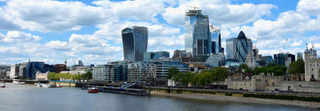 Skyscrapers of the City of London over the Thames , Englandの写真素材