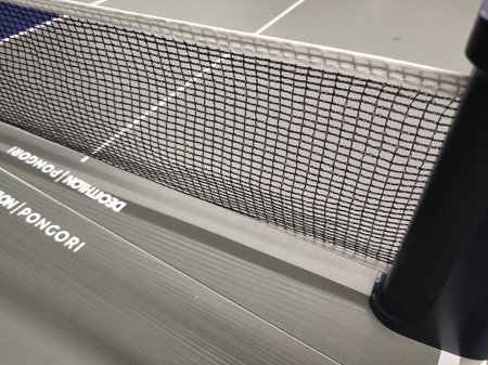 Tennis net on table tennis court. Close up. Selective focus.の写真素材
