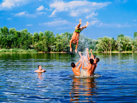 fun in the water by a group of young boysのeditorial素材