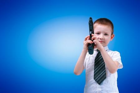 boy in a white shirt and tie with arms