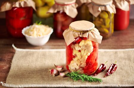 Still life of canned vegetables shot close-up against a dark backgroundの写真素材