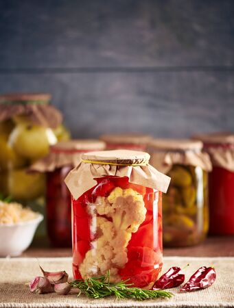 Still life of canned vegetables shot close-up against a dark backgroundの写真素材