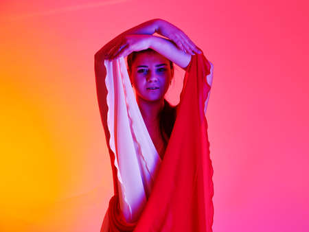 Young sensual model girl. Color face art studio photo.の写真素材