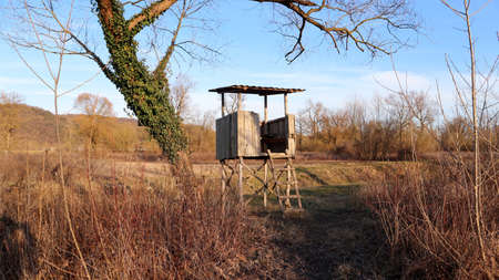 Wooden, hunting structure in the bush on the edge of Oresje lake, used for watching and observing animals in the wild, near Zagreb city, Croatiaの写真素材