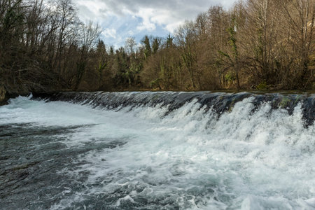 Forest waterfall of Slunjcica river, passing through the mountain forest near Plitvice lakes, Croatiaの写真素材